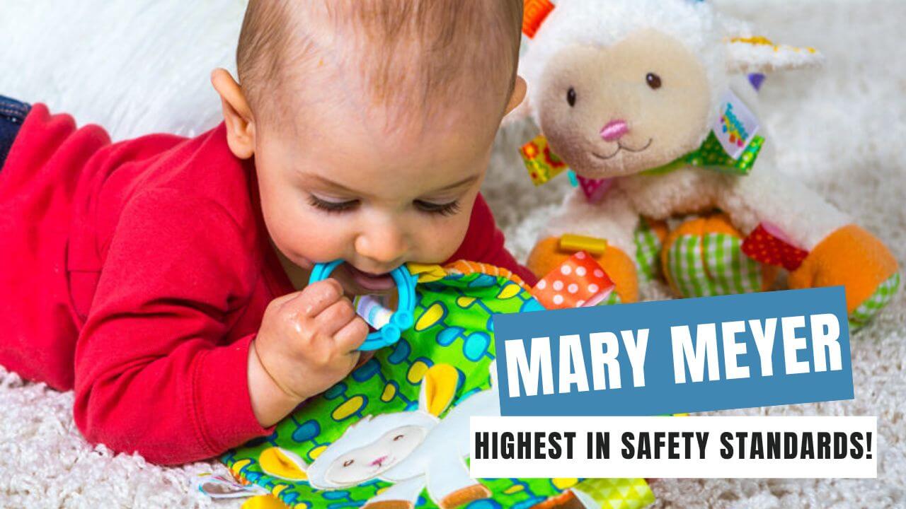 Are Mary Meyer products safe for babies? Baby chewing on a Mary Meyer Taggies baby toy and playing with a stuffed animals.