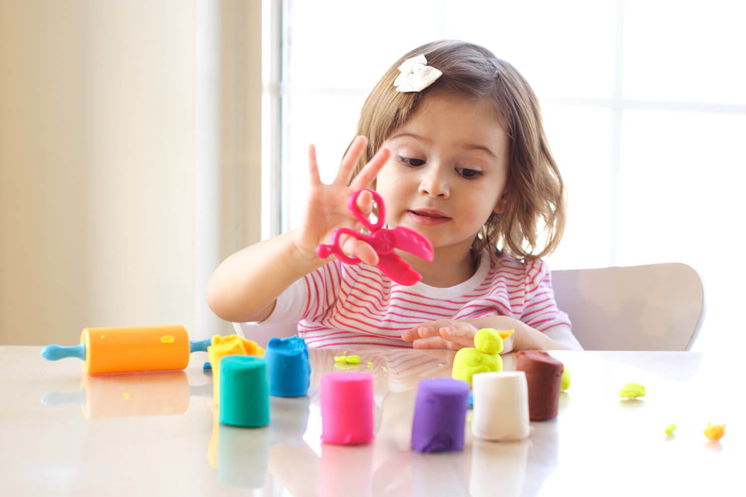 Teach Scissor Skills by Cutting Play-Doh - Teaching Littles