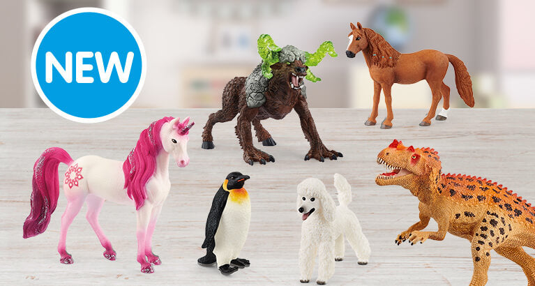 Several Schleich 2021 releases including a unicorn, emperor penguin, horse, poodle, dinosaur and rock beast.