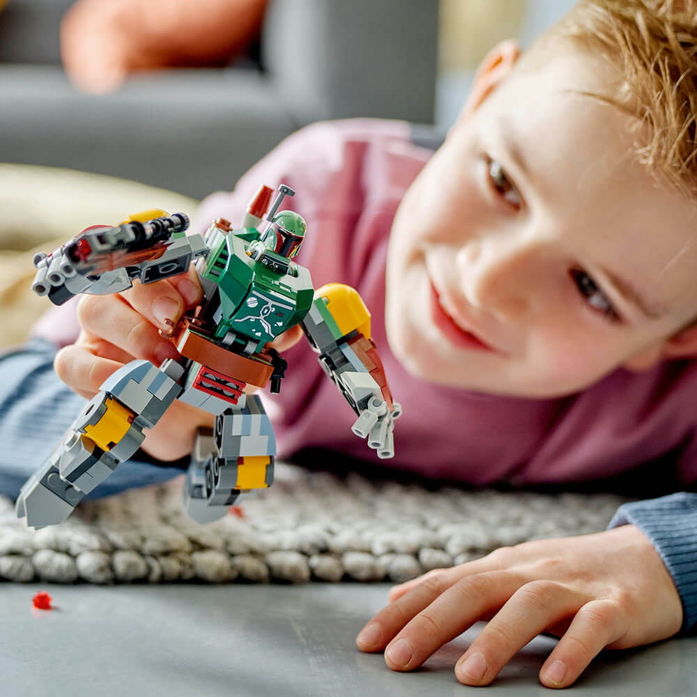 Child shown playing with the LEGO® Star Wars™ Boba Fett™ Mech 75369 Building Toy Set (155 Pieces)