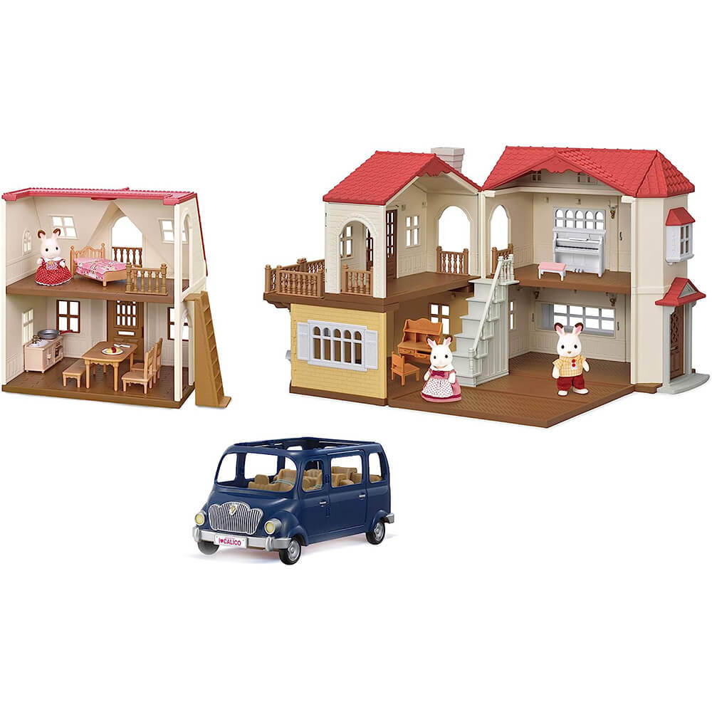 Pieces of the Calico Critters Red Roof Grand Mansion Gift Set inside the mansion with the vehicle in front
