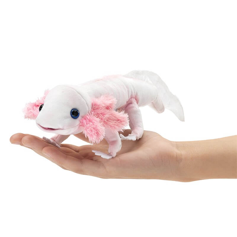 The Folkmanis Axolotl Finger Puppet in someone's hand.