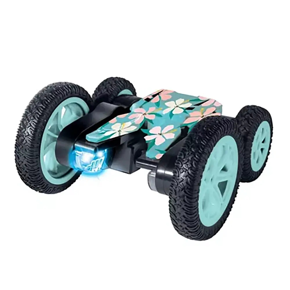Genesis Floral LED Stunt Racer toy car with a teal and pink flower-patterned body, large rubber tires, and glowing blue LED lights, designed for 360-degree flips and stunts on multiple surfaces.
