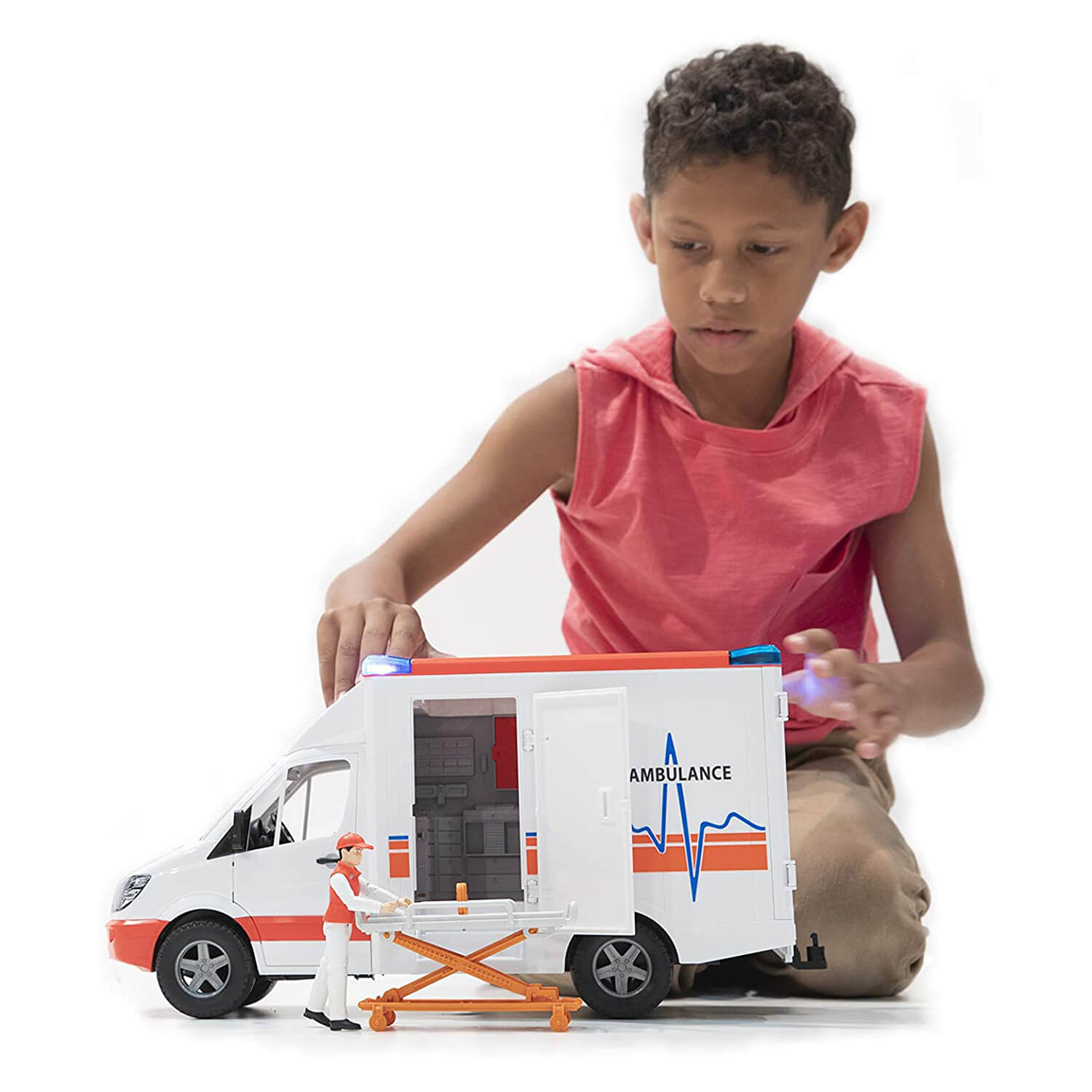 Kid playing with the ambulance toy.