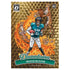 Panini Optic football card Travis Hunter gold and orange printed cardstock with illustrated jaguar pattern, Jacksonville Jaguars themed rookie card design with dynamic layered graphics
