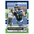 Panini Optic football card Jaxon Smith-Njigba blue and green printed cardstock with clean modern layout, Seattle Seahawks receiver shown mid play on blurred stadium background