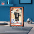 Panini Donruss Optic NFL football card display in black, orange, and white printed cardstock with rectangular shape, featuring quarterback image on stand, collector showcase on desk setting background