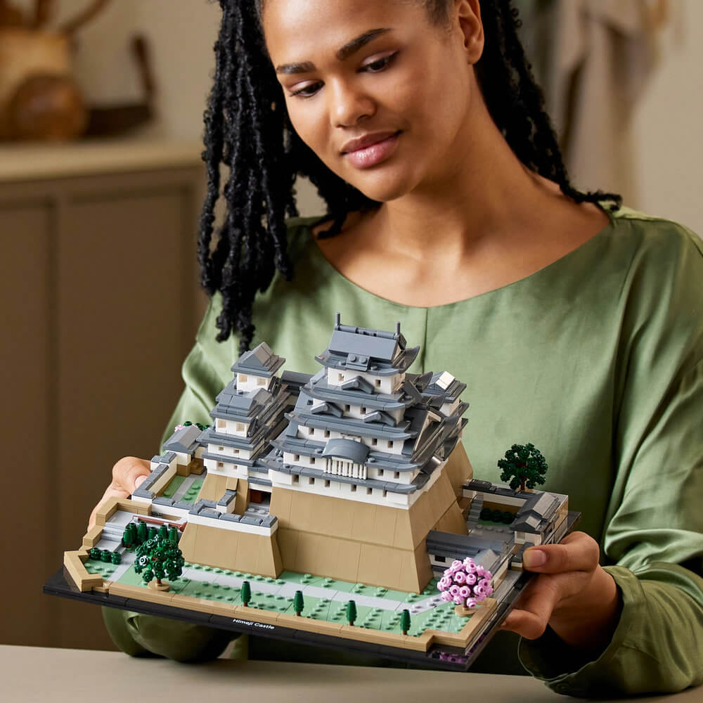 Woman holding the completed LEGO® Architecture Himeji Castle 21060 Building Set (2,125 Pieces)
