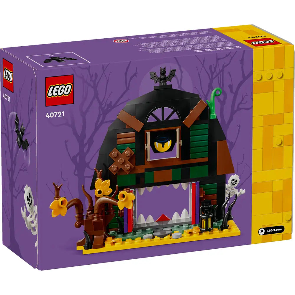 Back of LEGO Halloween Barn set 40721 box shows the buildable haunted barn with a monster mouth door that opens, spooky plants, skeletons, and a bat figure on top for added Halloween fun.