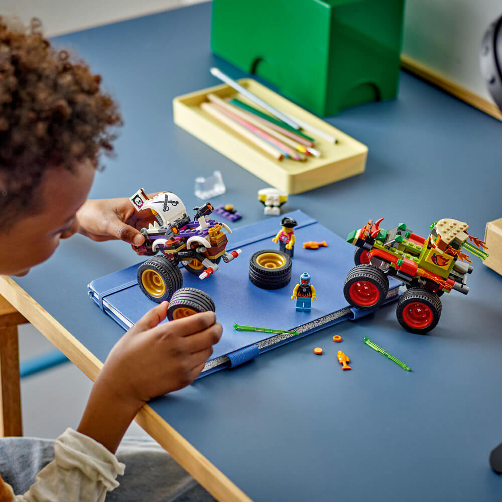 Child shown building the LEGO® City Monster Truck Race 60397 Building Toy Set (301 Pieces)