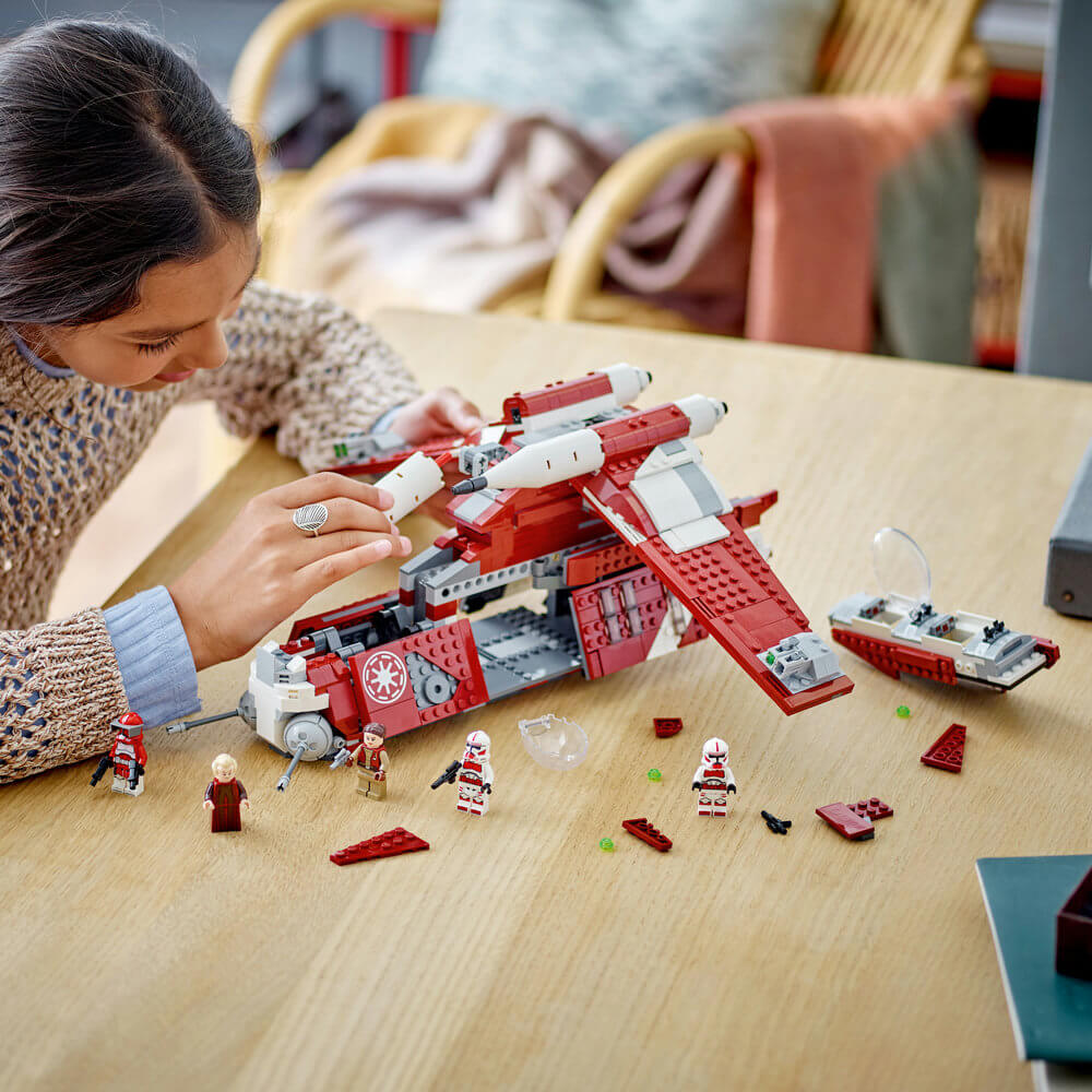 Person shown building the LEGO® Star Wars Coruscant Guard Gunship™ 1083 Piece Building Set (75354)