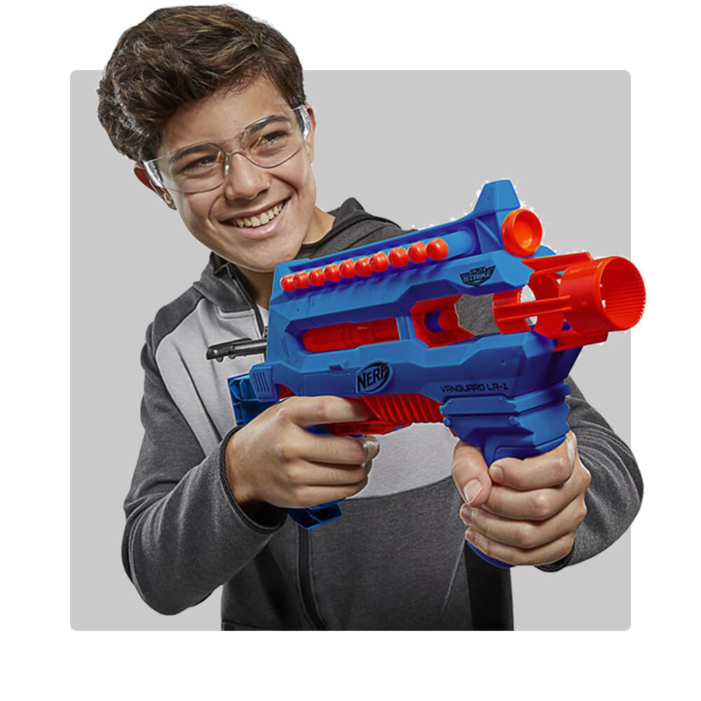 Active play and outdoor toys. Boy playing with NERF.