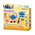 Yellow Disney Aquabeads Stitch craft kit box featuring Stitch bead art examples and text “Just add water!” displayed alongside tropical accessory designs on the front panel.