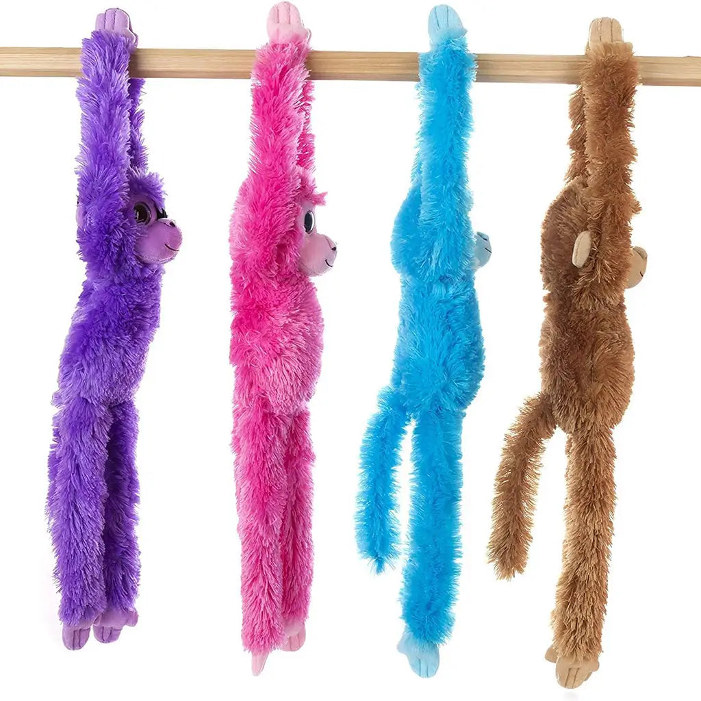 Aurora hanging monkey plush toy in bright blue polyester fur with a long slim body, extended arms for hanging, soft rounded face, and playful design, created as a cuddle friendly toy on a white background.
