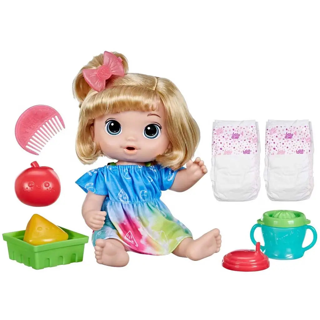 Baby Alive Fruity Sips doll set with blonde doll in tie-dye dress, pink comb, pretend fruit, tray, teal sippy cup, and diapers arranged neatly on a clean white backdrop.