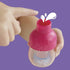 Baby Alive Harper Hugs bubble bottle close-up featuring pink cap and clear base with illustrated splash effect, demonstrating fun shampoo play for imaginative bath routines.