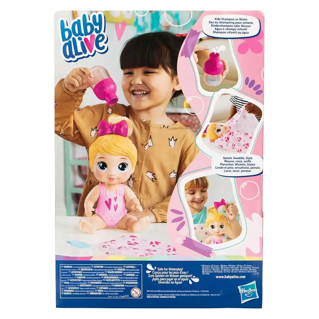 Baby Alive Harper Hugs package back showing doll, accessories and play ideas like washing, swaddling and styling, all set against a pink bubbly illustrated backdrop.