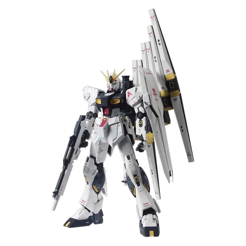 Gundam model kit Bandai RX-93 Nu Gundam features white layered armor with molded plastic textures, angular mechanical limbs, and an extended fin-funnel pack posed upright against a plain studio backdrop.