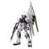 Gundam model kit Bandai RX-93 Nu Gundam features white layered armor with molded plastic textures, angular mechanical limbs, and an extended fin-funnel pack posed upright against a plain studio backdrop.