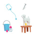 Barbie farm vet set accessories including blue stethoscope, feeding bottle, lamb figurine, syringe, blue bucket, and brown table for imaginative animal care play.