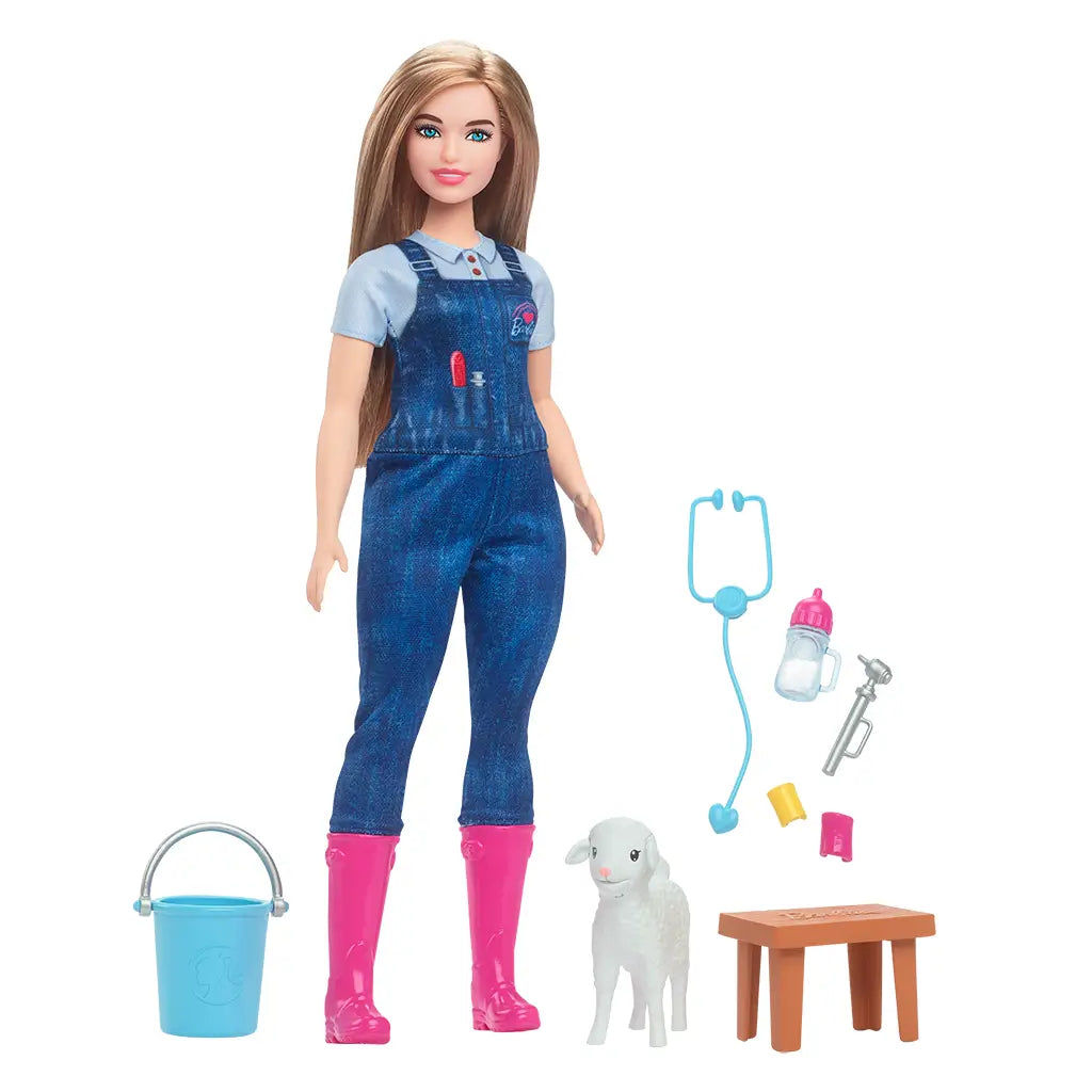 Barbie farm veterinarian doll in denim overalls and pink boots shown with lamb, stethoscope, bucket, syringe, feeding bottle, yellow cast, and exam table.