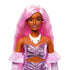 Close-up of Barbie Deluxe doll’s face with long pink hair, wearing pearl earrings, a white rose necklace, and a shiny pink ruched dress with matching gloves.