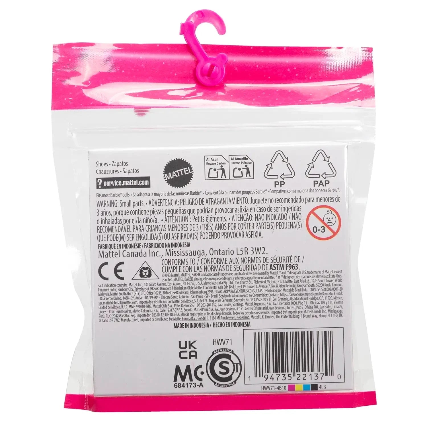 Back of Barbie doll shoes accessory pack showing safety warnings, recycling symbols, and manufacturer information in multiple languages.