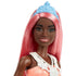 Close-up of Barbie Dreamtopia princess doll's face with light pink hair, blue tiara, glittery makeup, and friendly smile for imaginative fairytale play.