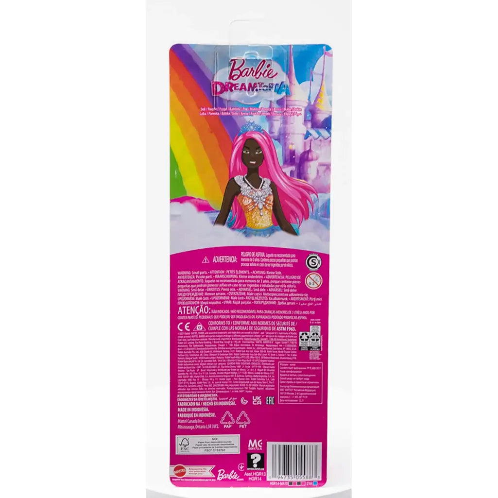 Rear view of Barbie Dreamtopia doll packaging, highlighting the pink-haired doll in a fantasy setting with a rainbow and castle illustration and safety information.