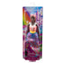 Barbie Dreamtopia princess doll in original packaging, featuring pink hair, blue tiara, multicolored top, and floral rainbow skirt with fantasy castle background.