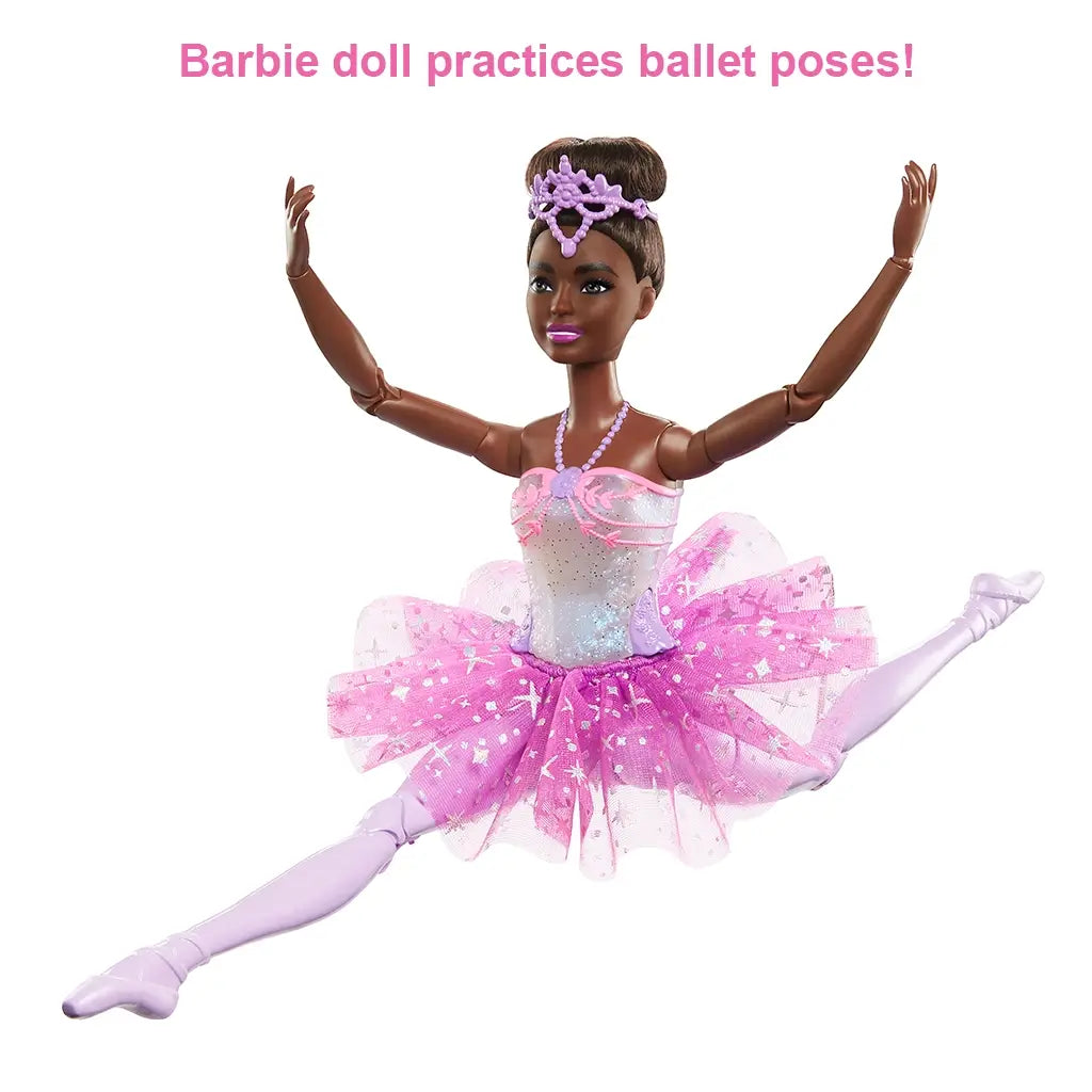 Barbie Dreamtopia ballerina doll in mid-split ballet pose, wearing a shimmering pink tutu, lavender tights, and tiara, showcasing her fully poseable limbs.