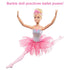 Barbie Dreamtopia Twinkle Lights Ballerina doll in pink glitter tutu and tiara performs a full split ballet pose with arms raised gracefully against a white background.