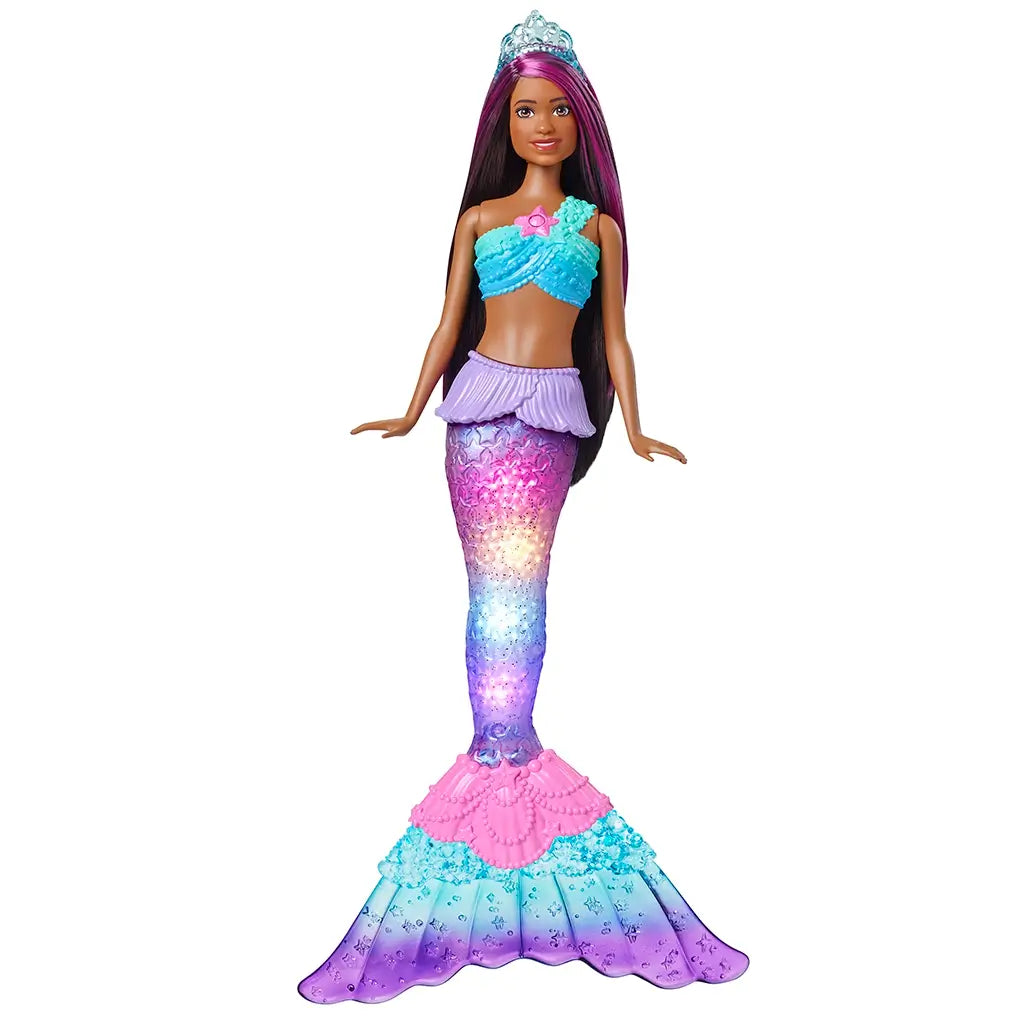 Full view of Barbie Dreamtopia Twinkle Lights Mermaid doll wearing tiara, turquoise top, lilac skirt, and shimmering multicolor light-up tail designed for magical water play.