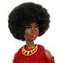 Close-up of Barbie doll with natural textured black afro, gold geometric necklace, and glittery red dress, showcasing her confident expression and vibrant style.