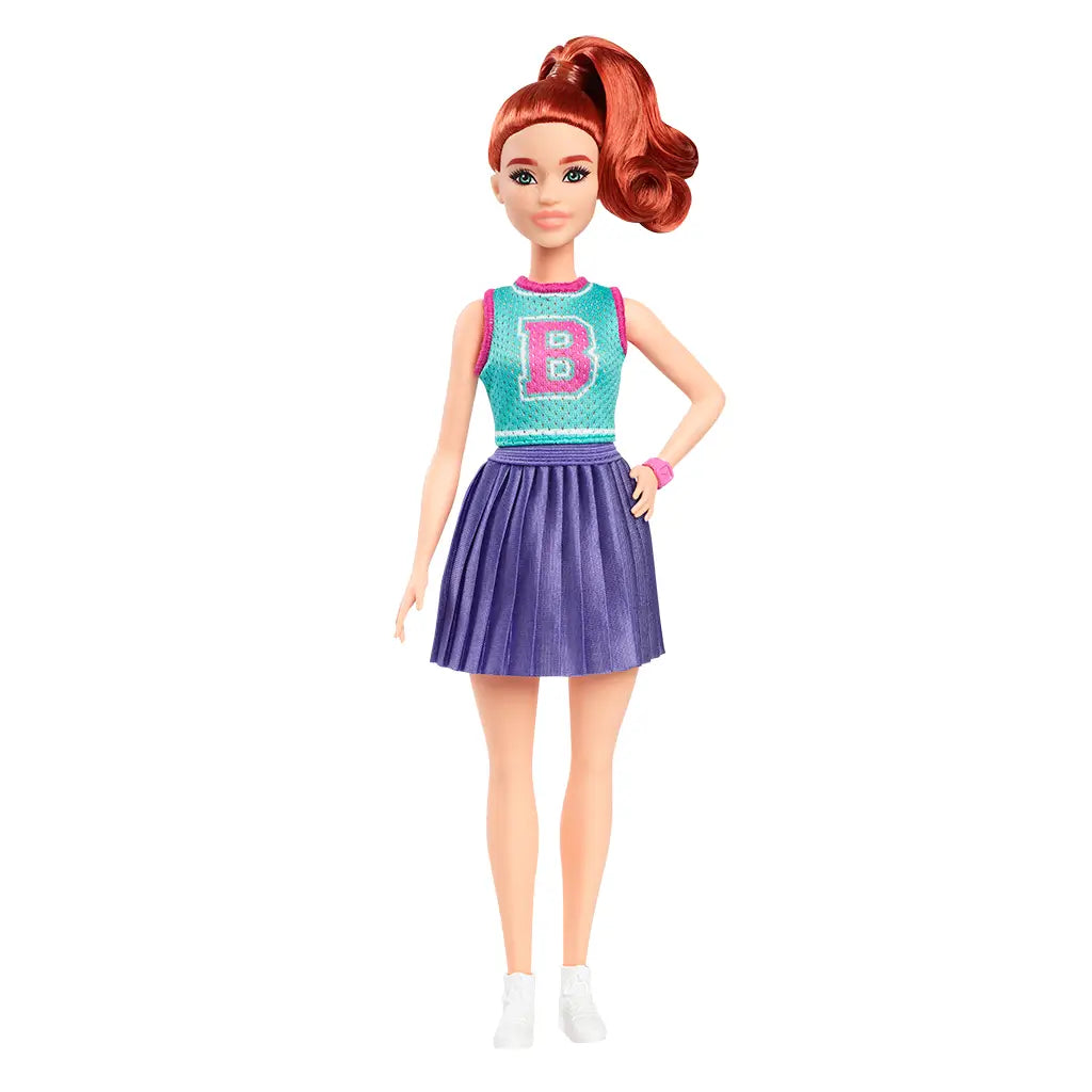 Front view of Barbie Fashionistas 232 doll styled with teal top, purple skirt, pink watch, and white sneakers, posed with hand on hip for sporty look.