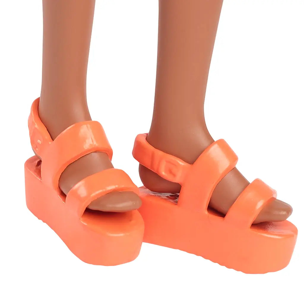 Close-up of Barbie Fashionistas 233 doll’s bright orange platform sandals with two straps over the foot.