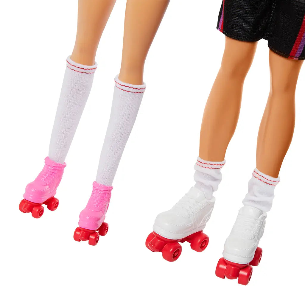 Roller skates with pink and white socks on a white background