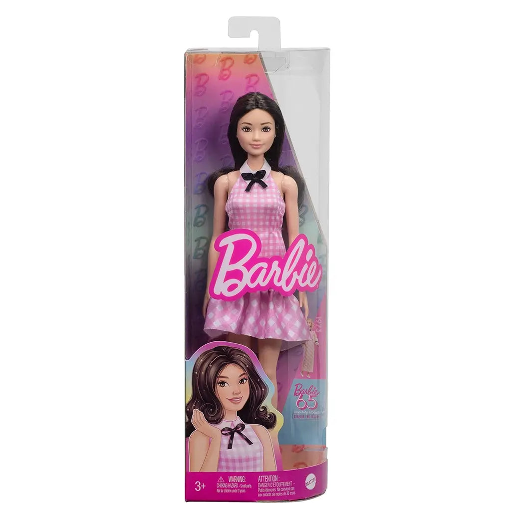 Barbie Fashionistas doll 224 shown in original retail packaging, featuring doll with black hair in pink gingham dress and accessories, with Barbie 65th anniversary branding.