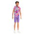 Barbie Fashionistas Ken doll #227 shown at an angle, wearing multicolor swirl-patterned sleeveless hoodie, purple shorts, and white sneakers.