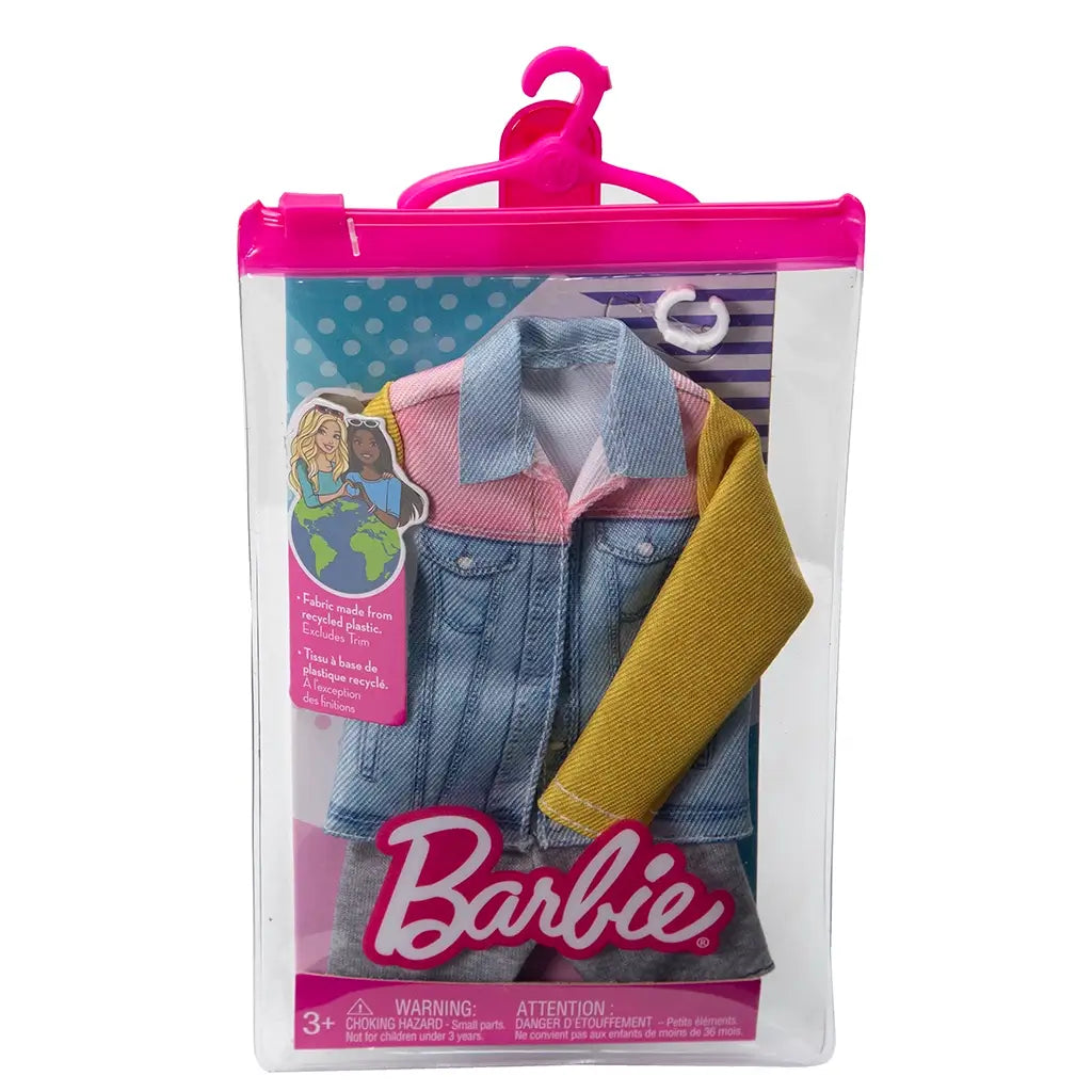 Barbie Ken doll fashion pack in clear pink hanger package with denim jacket featuring pink collar, yellow sleeve, and eco-friendly label, designed for mix-and-match styling.