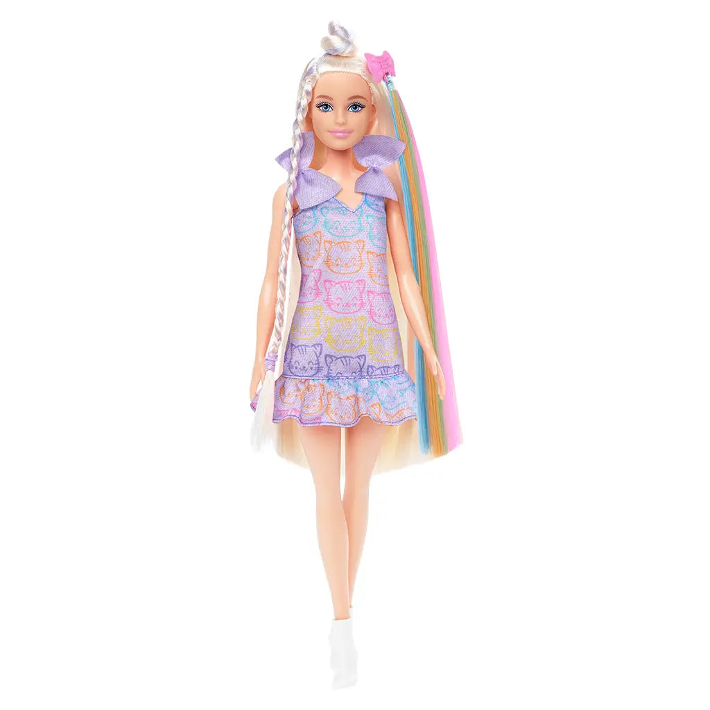 Barbie blonde fashion doll with extra-long platinum hair styled in braids, wearing a pastel kitten-print dress with purple ruffle collar and rainbow hair extension accessory.