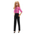 Barbie Future Leader doll with blonde hair in sleek style, dressed in pink jacket, black pants, and heels, posed with hand on hip to inspire imaginative role-play and leadership.