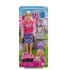 Packaged Barbie I Love School doll set showing blonde Barbie in pink jacket and plaid skirt, with included accessories like backpack, laptop, headphones, and school tools.