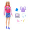 Barbie fashion doll with long blonde hair wearing a pink varsity jacket and plaid skirt, displayed with school accessories including backpack, laptop, headphones, and supplies.