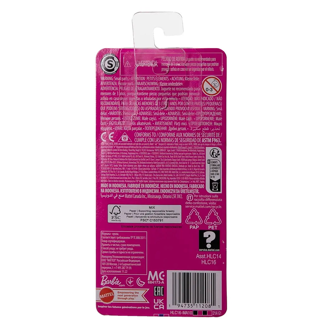 Back packaging of Barbie Mermaid Chelsea doll, showing multilingual safety warnings, recycling symbols, manufacturer details, and product information on a pink background.