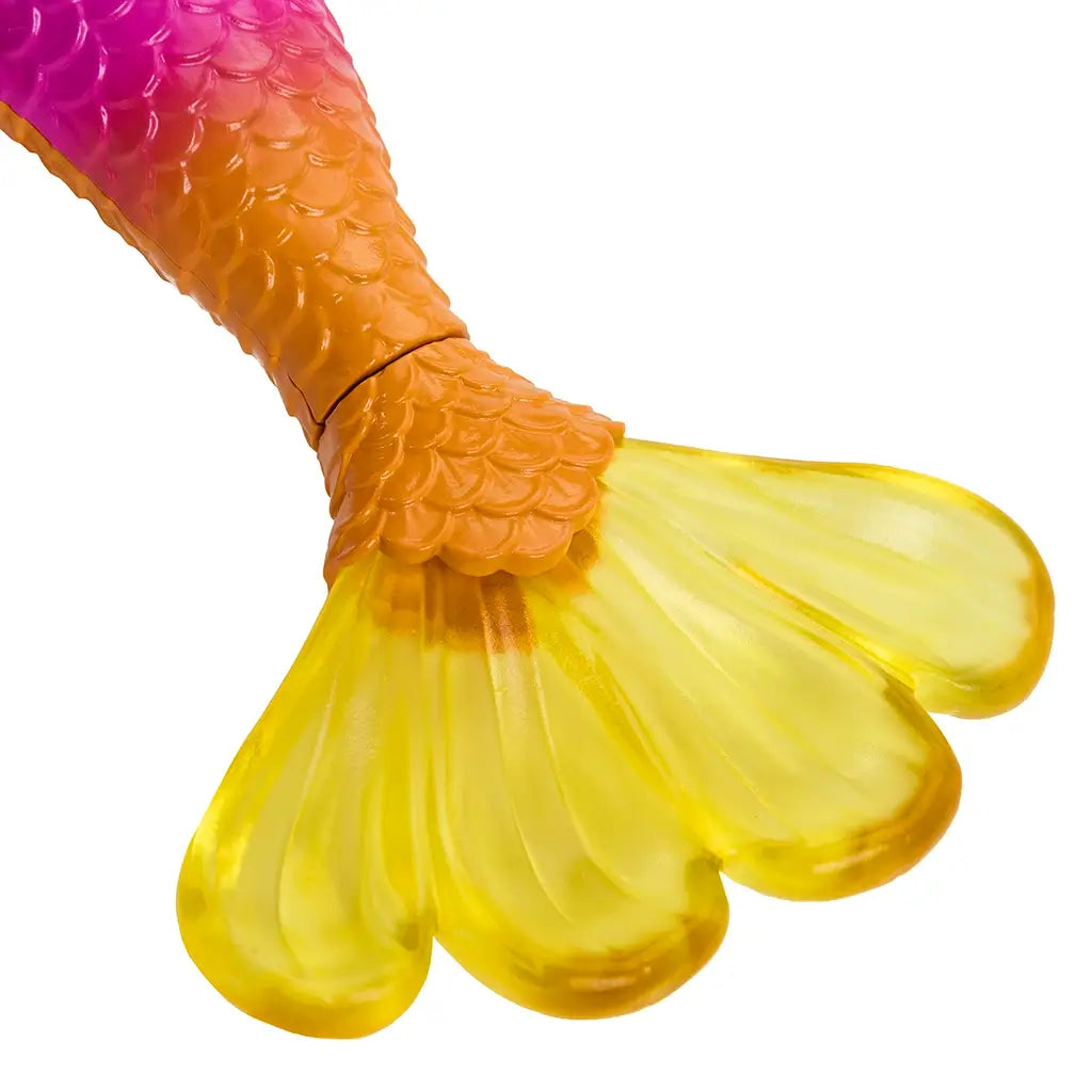 Close-up of a Barbie Mermaid Chelsea doll's colorful tail featuring detailed orange scales and a wide, translucent yellow fin shaped like flower petals, ideal for imaginative play.