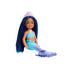 Barbie Chelsea mermaid doll posed seated with flowing dark blue hair, lavender tiara, aqua seashell top, and ombre blue-to-purple sculpted tail fin designed for imaginative play.