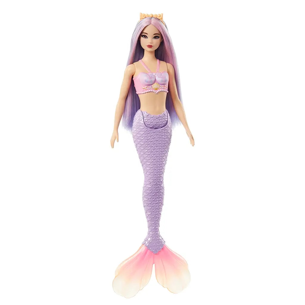 Barbie mermaid doll with long lilac and pink hair, wearing a pink seashell top with gold accents and a purple scale-pattern tail with a pink gradient fin. Designed for imaginative play, this Barbie mermaid doll blends colorful fantasy details with a shimmering aquatic theme, perfect for collectors or kids.