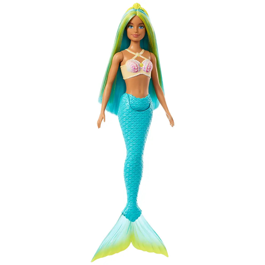 Full-body view of Barbie mermaid doll with long blue and yellow hair, wearing a turquoise sculpted mermaid tail and seashell-themed top.