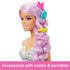 Barbie mermaid doll with pink hair styled in a braid, accessorized with colorful combs and barrettes, shown wearing a pastel seashell-themed top.